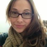 Photo of Karly with glasses and scarf